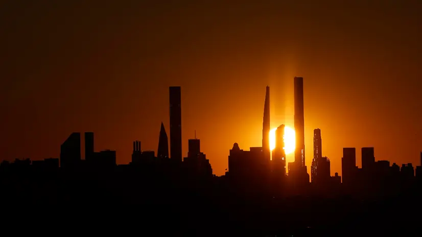 epa11581000 The sun sets over the Manhattan skyline as seen from Arthur Ashe Stadium at the USTA Billie Jean King National Tennis Center during the eighth day of the US Open Tennis Championships in Flushing Meadows, New York, USA, 02 September 2024. The US Open tournament runs from 26 August through 08 September. EPA/JOHN G. MABANGLO