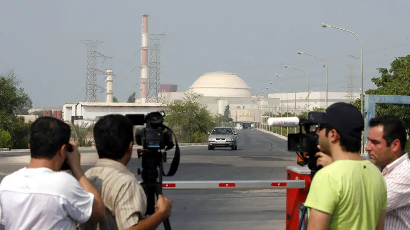 epa02293914 Cameramen and photographers gathered in front of the nuclear power plant in Bushehr, south Iran on 20 August 2010. The plant is to be opened on 21 August 2010 in a ceremony also to be attended by Russia's Rosatom Nuclear Energy State Corporation and officials of Iran's Atomic Energy Organization. The nuclear fuel will gradually be injected into the 1000 megawatt reactor and full capacity is scheduled to be reached in six months.EPA/Abedin Taherkenareh EPA/ABEDIN TAHERKENAREH