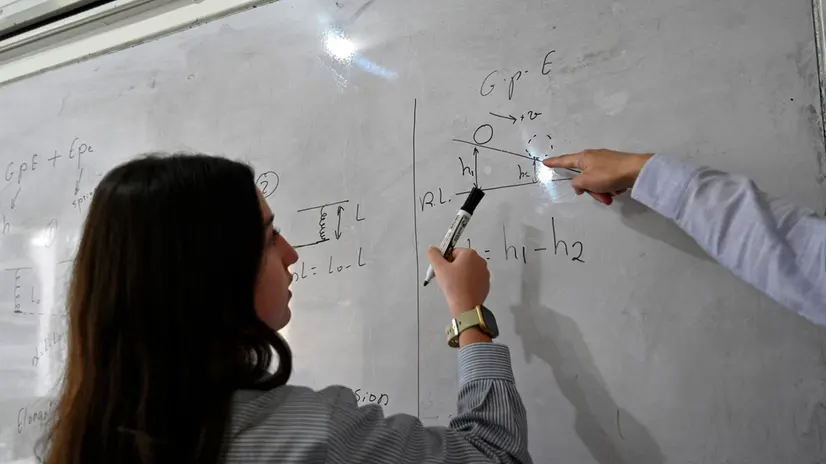 epa11700979 A Lebanese student attends the first day of lessons at Abdullah Al Alaili public secondary school for girls in Beirut, Lebanon, 04 November 2024. Some schools are opening on a shift basis in Lebanon on 04 November, the country's Minister of Education, Abbas Halabi, confirmed, after the start date was postponed due to the ongoing Israel-Hezbollah conflict. The ministry has designated 350 public schools and 169 private schools that will host public schoolchildren. EPA/WAEL HAMZEH