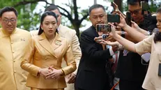 epa12270053 Court suspended Thai Prime Minister Paetongtarn Shinawatra (L), serving Culture Minister role, arrives for a cabinet meeting at the Government House in Bangkok, Thailand, 29 July 2025. The Royal Thai government issued a formal statement condemning Cambodia for violating the ceasefire agreement scheduled to take effect at midnight on 28 July 2025. Thailand is preparing to file formal protests with the Association of Southeast Asian Nations (ASEAN), the United States, and China. All branches of the Thai armed forces have been ordered to maintain full readiness to defend the Kingdom of Thailand's sovereignty. EPA/NARONG SANGNAK