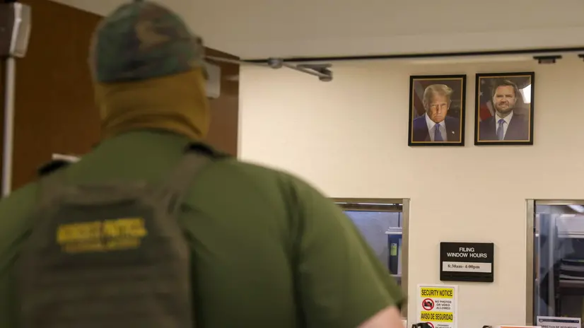 epaselect epa12251753 Portraits of US President Donald Trump and Vice President JD Vance are seen inside of a federal building that holds immigration court hearings in New York, New York, USA, 21 July 2025. ICE has continued to increase their enforcement following mandatory check-ins at immigration court hearings after the Trump administration ordered officials to increase detentions to 3,000 migrants per day. EPA/SARAH YENESEL