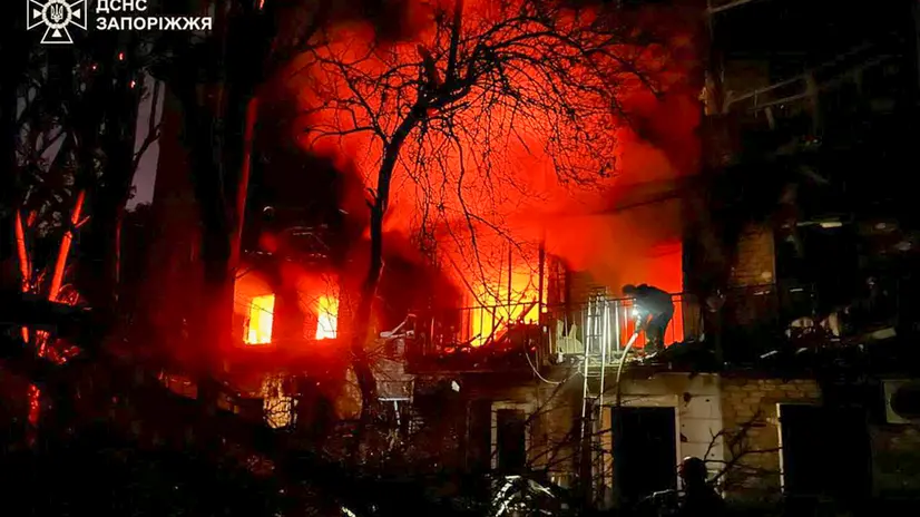 epa12335628 A handout photo released by the press service of the State Emergency Service (SES) of Ukraine shows Ukrainian rescuers working at the site of a Russian strike on a residential area in Zaporizhzhia, southeastern Ukraine, 30 August 2025, amid the Russian invasion. At least one person was killed and 22 others were injured, including three children, after Russian forces launched an overnight attack on Zaporizhzhia and surrounding areas, SES said. According to Ukrainian authorities, a large-scale attack across Ukraine was launched with around 540 drones, 8 ballistic missiles, and 37 other types of missiles. EPA/STATE EMERGENCY SERVICE OF UKRAINE HANDOUT -- BEST QUALITY AVAILABLE -- MANDATORY CREDIT: STATE EMERGENCY SERVICE OF UKRAINE -- HANDOUT EDITORIAL USE ONLY/NO SALES