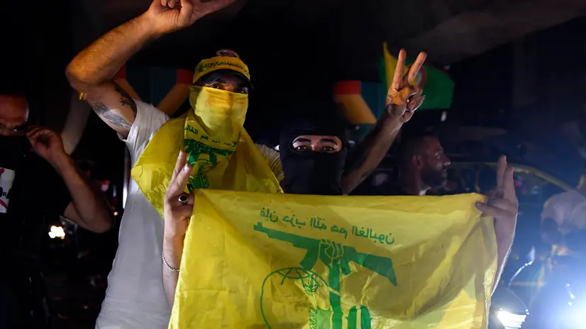 epa12290434 Supporters carry flags of Hezbollah as they rally on motorcycles to protest the Lebanese government's endorsement of a plan to disarm it, in the southern suburb of Beirut, Lebanon, 08 August 2025. Supporters of Hezbollah gathered to protest against the cabinet's decision to withdraw the militant group's weapons. EPA/WAEL HAMZEH