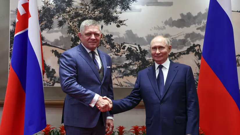 epa12345660 Slovak Prime Minister Robert Fico (L) and Russian President Vladimir Putin pose for photos before a meeting at Diaoyutai State Guesthouse in Beijing, China, 02 September 2025. EPA/ALEXANDER KAZAKOV / SPUTNIK / KREMLIN POOL MANDATORY CREDIT
