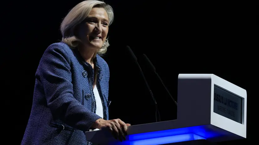 epa12067600 President of the far-right Rassemblement National (RN) parliamentary group, Marine Le Pen, attends a meeting during the party's traditional May Day gathering in Narbonne, southern France, 01 May 2025. Labor Day, or May Day, is observed worldwide on the first day of May to celebrate the economic and social achievements of workers and fight for laborers' rights. EPA/GUILLAUME HORCAJUELO