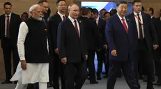 Modi, Putin e Xi Jinping - Foto Epa © www.giornaledibrescia.it