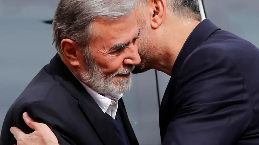 epa11250994 Iranian Foreign Minister Hossein Amir Abdollahian welcomes Palestinian Islamic Jihad (PIJ) leader Ziyad al-Nakhalah (L) prior to their meeting in Tehran, Iran, 30 March 2024. Nakhalah is visiting Tehran to meet with top Iranian officials. EPA/ABEDIN TAHERKENAREH
