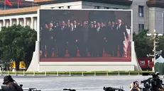 epa12347237 A screen shows Chinese President Xi Jinping (C), Russian President Vladimir Putin (3-L) and North Korean leader Kim Jong Un (3-R) arriving for a military parade in Beijing, China, 03 September 2025. China holds on 03 September celebrations to mark the 80th anniversary of the end of the Second Sino-Japanese War, known in China as the War of Resistance against Japanese aggression, and the end of World War II. EPA/ANDRES MARTINEZ CASARES