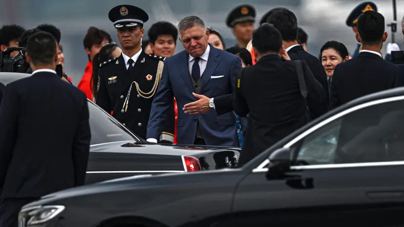 epa12344917 Slovakia’s Prime Minister Robert Fico arrives at the Beijing Capital International Airport, ahead of the military parade marking the 80th anniversary of victory over Japan and the end of World War II, in Beijing, China, 02 September 2025. EPA/JADE GAO / POOL