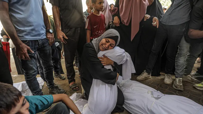 epaselect epa12347958 A mother mourns over the body of her daughter Shayma, wife of Mohammed Ahmad at Al Shifa hospital in Gaza City, Gaza Strip, 03 September 2025. According to the Palestinian Ministry of Health in Gaza, Mohammed Ahmad, his wife Shayma, and his daughters Sara and Tala were killed in an Israeli air strike across Gaza on 02 September. More than 64,000 Palestinians have been killed in the Gaza Strip since October 2023, according to the Palestinian Ministry of Health, and about 1,200 Israelis have been killed since the launch of an Israeli military campaign in response to a cross-border attack by Hamas on 07 October 2023. EPA/MOHAMMED SABER