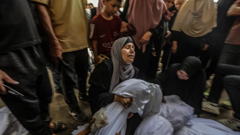 epa12347956 A mother mourns over the body of her daughter Shayma, wife of Mohammed Ahmad at Al Shifa hospital in Gaza City, Gaza Strip, 03 September 2025. According to the Palestinian Ministry of Health in Gaza, Mohammed Ahmad, his wife Shayma, and his daughters Sara and Tala were killed in an Israeli air strike across Gaza on 02 September. More than 64,000 Palestinians have been killed in the Gaza Strip since October 2023, according to the Palestinian Ministry of Health, and about 1,200 Israelis have been killed since the launch of an Israeli military campaign in response to a cross-border attack by Hamas on 07 October 2023. EPA/MOHAMMED SABER