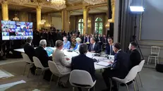 epa12351060 France's President Emmanuel Macron (2-R) and Ukraine's President Volodymyr Zelensky (R) chair a meeting with international leaders during the Coalition of the Willing Summit at the Elysee Presidential Palace in Paris, France, 04 September 2025. European leaders and Ukrainian President Volodymyr Zelensky met in Paris on 04 September 2025 in a renewed effort to pressure Russia's President Vladimir Putin after he vowed that Russia will continue fighting in Ukraine if no peace deal is reached. EPA/LUDOVIC MARIN / POOL MAXPPP OUT