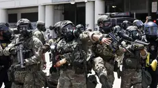 epa12164975 Members of the California National Guard try to disperse protestors in front of the Edward R. Roybal Federal Building in Los Angeles, California, USA, 08 June 2025. US President Donald Trump has deployed approximately 2,000 National Guard troops to Los Angeles, despite not receiving a request from the state of California for any additional assistance, following large protests against ongoing immigration enforcement raids area over the last couple of days. EPA/CAROLINE BREHMAN