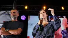 La segretaria del Pd, Elly Schlein, alla prima serata della 'Festa regionale de L'unità' che in Puglia a Bisceglie settembre prossimi. La segretaria insieme all'europarlamentare del Pd, Antonio Decaro, e al segretario del Pd Puglia, Domenico De Santis. Schlein ha ufficializzare la candidatura alla presidenza della Regione dell'ex sindaco di Bari, Antonio Decaro.Bisceglie 05 09 2025 ANSA/DONATO FASANO