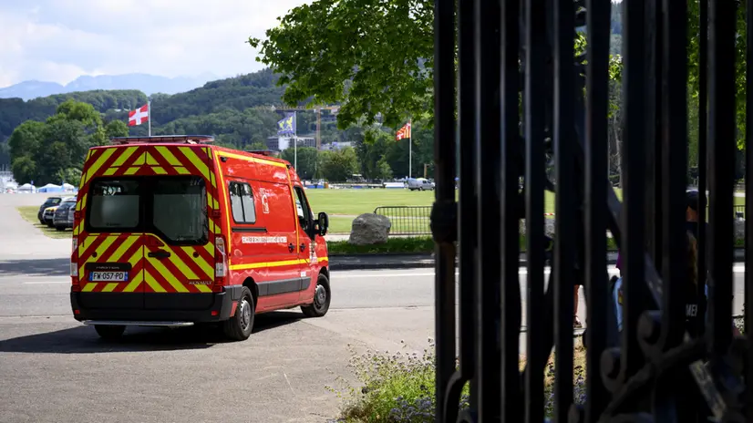 epa10679758 An ambulance drives at the scene of a knife attack in Annecy, France, 08 June 2023. The Prefecture of Haute-Savoie confirmed on 08 June that a man had carried out an attack in the Paquier d'Annecy park area, injuring at least six people who were taken to hospital, including four children. EPA/JEAN-CHRISTOPHE BOTT