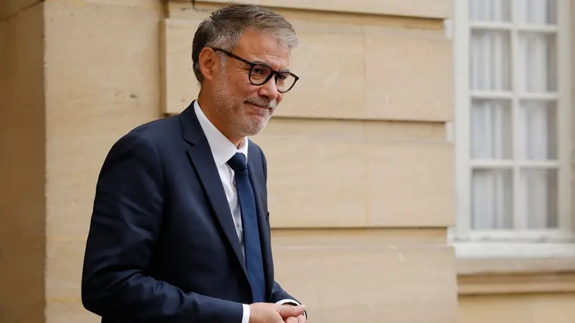 epa12351071 First Secretary of the Socialist Party (PS) Olivier Faure leaves the Hotel Matignon after meeting French Prime Minister Francois Bayrou as part of talks with different political parties ahead of a confidence vote in Paris, France, 04 September 2025. EPA/YOAN VALAT