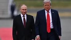 epa12303493 US President Donald Trump (R) welcomes Russian President Vladimir Putin, as they meet to negotiate at Joint Base Elmendorf-Richardson in Anchorage, Alaska, USA, 15 August 2025. EPA/SERGEY BOBYLEV/SPUTNIK/KREMLIN POOL MANDATORY CREDIT