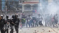 epa12362084 Protesters clash with police in front of the parliament building in Kathmandu, Nepal, 08 September 2025. Young demonstrators gathered in the capital to demand an end to corruption and the lifting of social media bans. The government shut down 26 platforms, including Facebook, YouTube, Instagram, and WhatsApp, after they refused to register in Nepal. At least six people were killed and dozens were injured during the protest. EPA/NARENDRA SHRESTHA