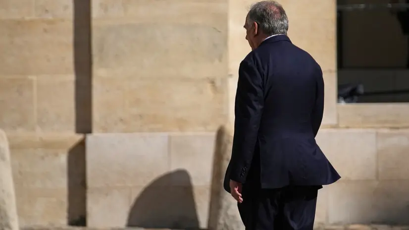 epa12354052 French Prime Minister Francois Bayrou attends a farewell ceremony for Chief of Staff of the French Armed Forces General Thierry Burkhard, in the courtyard of the Invalides, in Paris, France, 05 September 2025. EPA/CHRISTOPHE ENA / POOL MAXPPP OUT