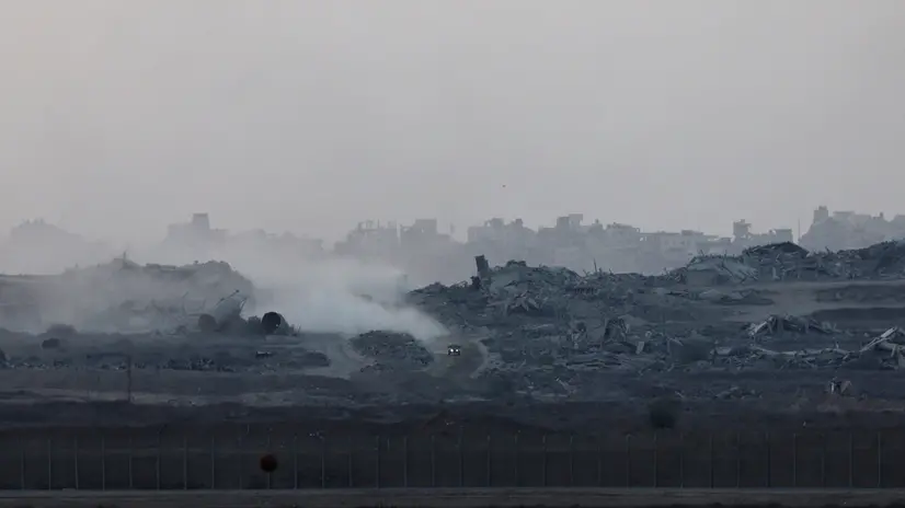 epaselect epa12362734 An Israeli vehicle patrols along the northern side of the Gaza border, as seen from an undisclosed location along the Israeli side of the border, 08 September 2025. EPA/ATEF SAFADI