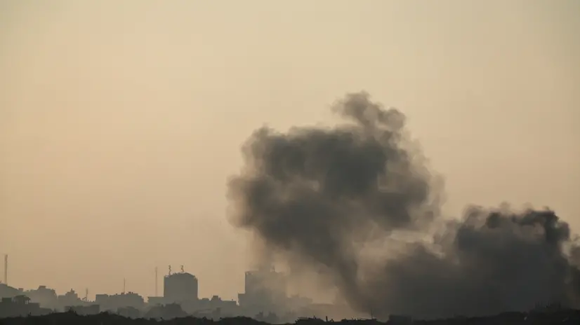 epa12362719 Smoke rises as a result of an Israeli airstrike on the outskirts of Gaza City, as seen from an undisclosed location along the Israeli side of the border, 08 September 2025. EPA/ATEF SAFADI