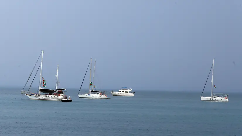epa12362763 Vessels, part of the Global Sumud Flotilla, off the coast of Sidi Bou Said, Tunisia, 08 September 2025. The flotilla, an international maritime initiative, is expected to depart from Tunis on 10 September, as part of a multi-country humanitarian effort to reach the shores of Gaza and deliver humanitarian aid. EPA/MOHAMED MESSARA