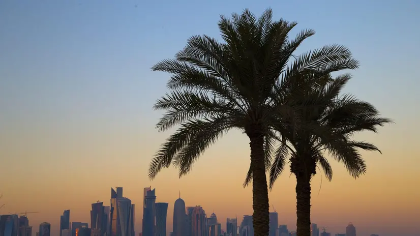 epa04591684 The skyline of Doha's West Bay high rise buildings at sunset, Doha, Qatar, 28 January 2015. The men's Handball World Championship 2015 is taking place in Qatar between 15 January to 01 February. Qatar 2015 via epa/NIC BOTHMA Editorial Use Only/No Commercial Sales