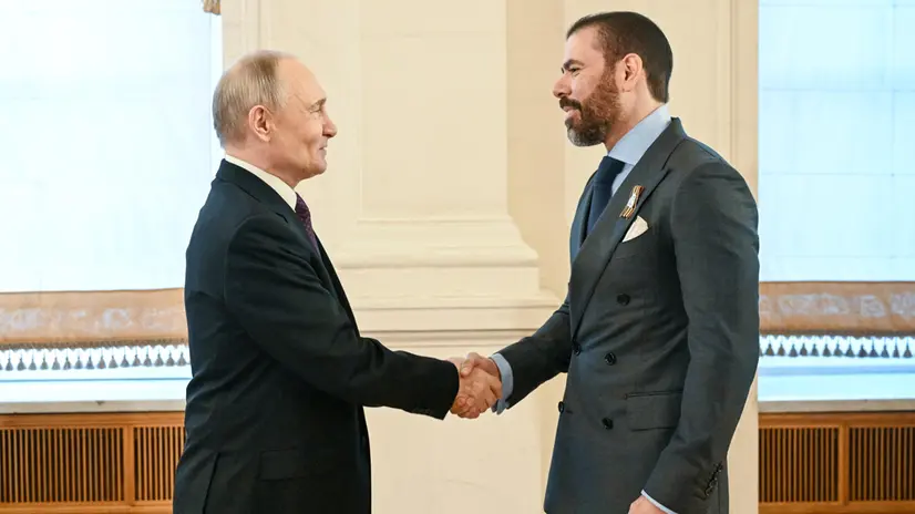 epa12085001 A handout photo made available by Photo host Agency RIA Novosti shows President of Russia Vladimir Putin (L) welcoming Special Representative of Co-Presidents of Nicaragua for Cooperation with Russia Laureano Ortega Murillo before a gala concert held for heads of foreign delegations invited to the celebrations of the 80th anniversary of Victory in the Great Patriotic War at the Kremlin in Moscow, Russia, 08 May 2025. Russia will mark the 80th anniversary of the victory in World War II over Nazi Germany and its allies on 09 May. EPA/SERGEY BOBYLEV /HOST PHOTO AGENCY RIA NOVOSTI HANDOUT HANDOUT EDITORIAL USE ONLY/NO SALES