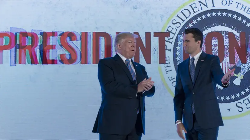 epa07735807 Charlie Kirk, president and founder of Turning Point USA inroduces US President Donald J. Trump to Turning Point USAâs Teen Student Action Summit 2019 (TSAS), Washington, DC, USA, 23 July 2019. TSAS takes place from 22 to 25 July with some 1000 student invited to attend. EPA/Chris Kleponis / POOL