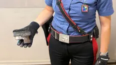 La pistola trovata addosso all'uomo