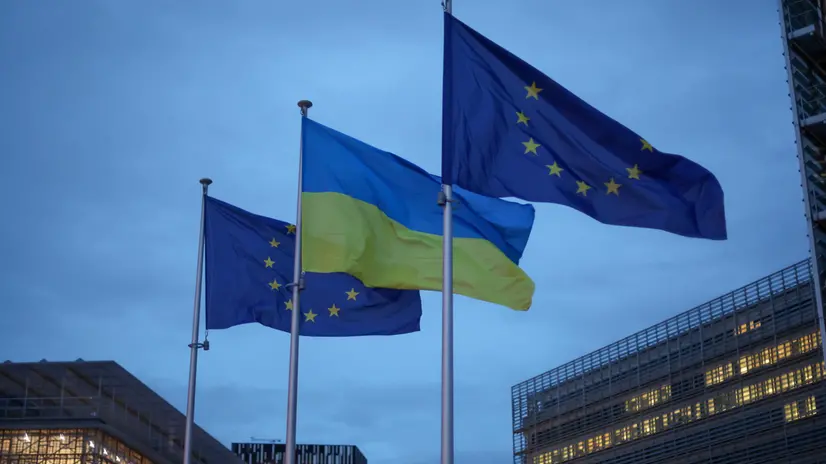 epa11920525 A view of European and Ukrainian flags in front of the European Union (EU) institution headquarters during an EU Foreign Affairs Council meeting in Brussels, Belgium, 24 February 2025. On the third anniversary of Russia's full-scale invasion of Ukraine, EU Foreign Affairs Ministers will discuss Russia's aggression against Ukraine. EPA/OLIVIER HOSLET
