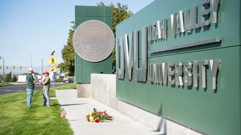 epa12369976 Flowers lay outside the Utah Valley University the day after Charlie Kirk, CEO and co-founder of the conservative youth organization Turning Point USA, was shot dead, at Utah Valley University in Orem, Utah, USA, 11 September 2025. Kirk was shot dead on 10 September at an event he was hosting at Utah Valley University. The suspect was still at large. EPA/MARIELLE SCOTT