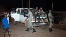 epa10787262 Security forces stand guard at a roundabout leading to Niamey, Niger, 05 August 2023 (issued 06 August 2023). Junta leaders in Niger face a 06 August deadline set by the Economic Community of West African States (ECOWAS) to release and reinstate ousted President Mohamed Bazoum, or face a possible military intervention. On 26 July General Abdourahamane Tchiani declared himself the new leader of Niger after mutinous soldiers led a coup against democratically elected President Bazoum. EPA/ISSIFOU DJIBO -- BEST QUALITY AVAILABLE