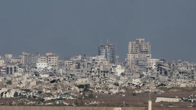 epa12366701 Ruined buildings in the Gaza Strip as seen from the Israeli side of the border with Gaza, in southern Israel, 10 September 2025. Israel's military said it is stepping up logistical and operational preparations ahead of expanded combat operations. EPA/ABIR SULTAN EPA