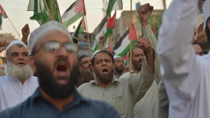epa12368108 Supporters of Islamic political party Jamat-e-Islami shout anti-Israel slogans during a protest against Israeli airstrikes on Qatar, in Peshawar, Pakistan, 10 September 2025. Israel struck Hamas leaders in Doha on 09 September in its first attack inside Qatar, calling it 'Operation Summit of Fire'. Qatar condemned the strike as a violation of sovereignty, while the US said it was informed but not involved. The attack threatens fragile ceasefire talks in the Gaza war, which has killed over 64,000 Palestinians. EPA/BILAWAL ARBAB