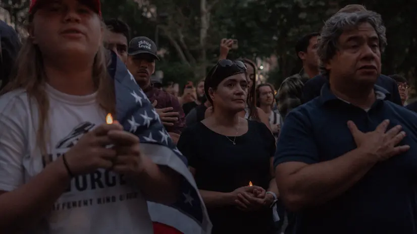 epa12372218 Mourners hold candles during a vigil for US conservative activist and Turning Point USA founder Charley Kirk in New York City, New York, USA, 12 September 2025. Kirk was fatally shot at a Utah university campus, USA, on 10 September 2025. EPA/OLGA FEDOROVA