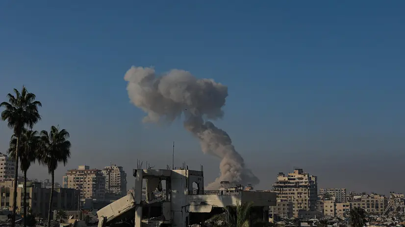 epa12375391 Smoke rises following an Israeli airstrike on Gaza City, Gaza Strip, 14 September 2025. Israeli forces are increasing their assault on Gaza City with a wave of heavy air strikes in recent days, in an escalation from previous military operations triggering a surge in civilian displacement. EPA/MOHAMMED SABER