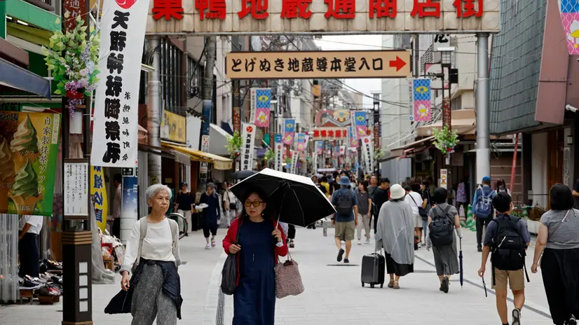 epa11607579 People stroll through a shopping street in Sugamo district in Tokyo, Japan, 16 September 2024. According to Japan's Ministry of Internal Affairs data released on the occasion of the 'Respect for the Aged Day', the number of people aged 65 and over has reached a record high of 36.25 million, representing 29.3 percent of the total population. While the total population of the country is declining, Japan has the highest percentage of population over 65 years old in the world. EPA/FRANCK ROBICHON