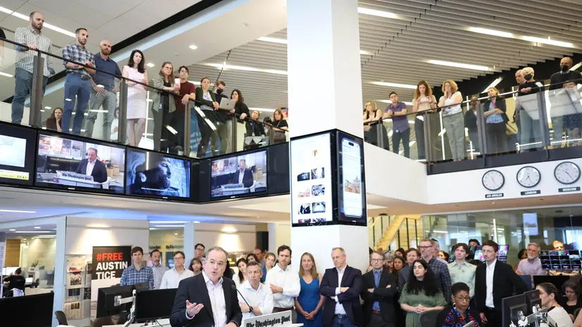 epa12076084 A handout photo made available by the Washington Post shows Washington Post Executive Editor Matt Murray (L) give remarks after the staff was awarded the Pulitzer Prize for Breaking News Reporting and to Ann Telnaes for Illustrated Reporting and Commentary in the newsroom, in Washington DC, USA, 05 May 2025. The Washington Post was a finalist in the following categories for Commentary, International Reporting, National Reporting, and Local Reporting. EPA/TOM BRENNER / THE WASHINGTON POST HANDOUT HANDOUT EDITORIAL USE ONLY/NO SALES