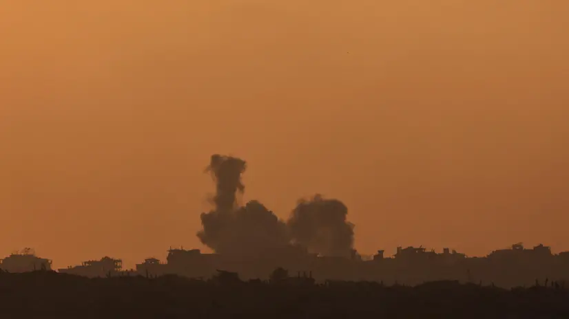 epa12380969 Smoke rises as a result of an Israeli airstrike on the outskirts of Gaza City, as seen from an undisclosed location on the Israeli side of the border, 15 September 2025. More than 64,900 Palestinians have been killed in the Gaza Strip since October 2023, according to the Palestinian Ministry of Health. EPA/ATEF SAFADI