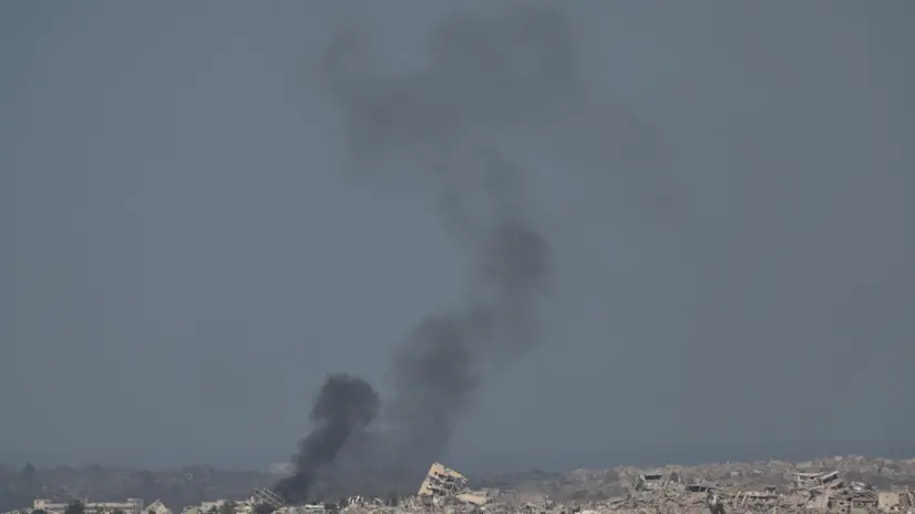 epaselect epa12381494 Smoke rises after an Israeli airstrike on the outskirts of Gaza City, as seen from an undisclosed location on the Israeli side of the border, 16 September 2025. More than 64,900 Palestinians have been killed in the Gaza Strip since October 2023, according to the Palestinian Ministry of Health. EPA/ATEF SAFADI