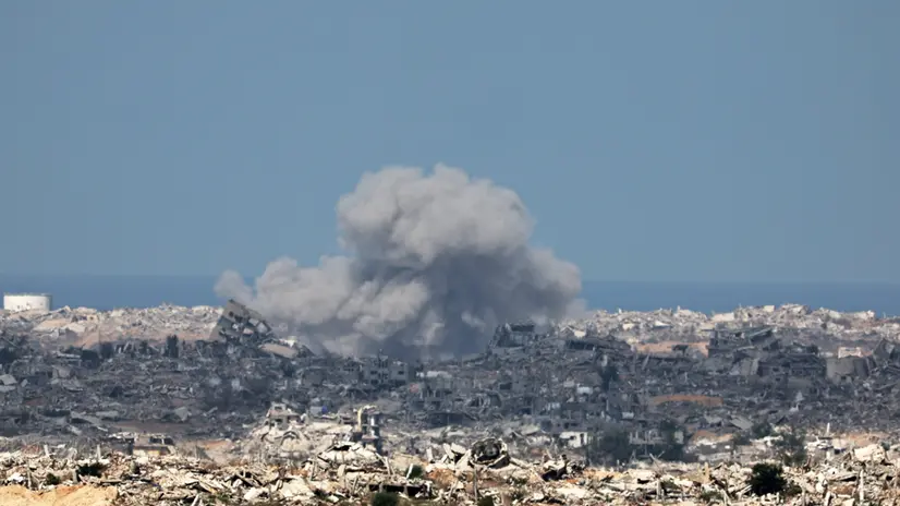 epaselect epa12381711 Smoke rises after an Israeli airstrike on the outskirts of Gaza City, as seen from an undisclosed location on the Israeli side of the border, 16 September 2025. Israeli Prime Minister Benjamin Netanyahu confirmed during a court appearance that the Israeli military has begun a major operation in Gaza City. More than 64,800 people have been killed in the Gaza Strip since October 2023, according to the Palestinian Ministry of Health. EPA/ATEF SAFADI