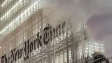 epa03676898 (FILE) A file photo dated 08 December 2008 showing a night view of the New York Times building in New York, New York, USA. The New York Times company reported a sharp drop in profits and revenue 25 April 2013 as advertising fell and the growth in online subscriptions slacked off. The newspaper company said it earned 3.1 million dollars in net income, compared to 42.1 million a year earlier, while revenue declined 2 per cent to 465.9 million dollars. Despite the disappointing financial results the company is on the right track to building a sustainable digital business, chief executive Mark Thompson said. EPA/JUSTIN LANE