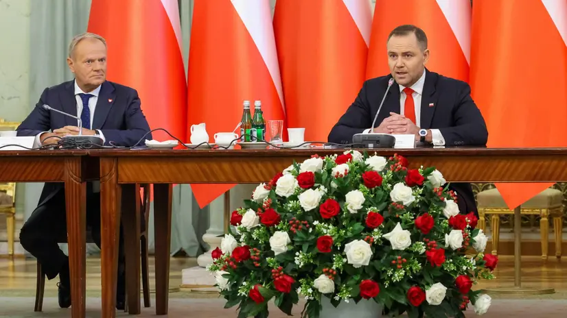 epa12325867 Polish President Karol Nawrocki (R) and Polish Prime Minister Donald Tusk (L) participate in the Cabinet Council meeting at the Presidential Palace in Warsaw, Poland, 27 August 2025. The Cabinet Council was convened by Polish President Karol Nawrocki for the first time, in which they discussed key issues related to the state of public finances, development investments such as the construction of the Central Communication Port and nuclear power plants, and the protection of Polish agriculture. EPA/Albert Zawada POLAND OUT
