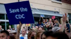 epa12332209 Current and former CDC workers and supporters gather to greet recently resigned CDC leaders Daniel Jernigan, Debra Houry and Demetre Daskalakis outside the entrance to the US Centers For Disease Control and Prevention in Atlanta, Georgia, USA, 28 August 2025. The Trump Administration has reportedly fired CDC Director Susan Monarez after less than a month on the job. At least four other top CDC officials have resigned in the wake of the controversy, surrounding vaccines, immunizations and other issues. EPA/ERIK S. LESSER
