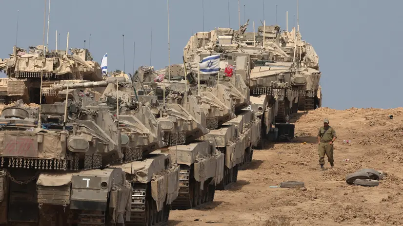 epa12384116 Israeli tanks deployed near the border with the Gaza Strip in southern Israel, 17 September 2025. Israel ramped up its offensive in the Gaza Strip on 16 September. More than 64,900 Palestinians have been killed in the Gaza Strip since October 2023, according to the Palestinian Ministry of Health. EPA/ABIR SULTAN