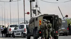 epa11593032 Israeli security forces on duty near the site after a truck driver opened fire at Allenby Bridge, also known as the King Hussein Bridge, crossing between Jordan and the West Bank, near Jericho, West Bank, 08 September 2024. Three Israelis were killed in a shooting attack at the border crossing, the Israeli army said in a post on social media. The driver approached the area of the Allenby Bridge from Jordan in a truck, exited the truck, and opened fire at the Israeli security forces operating at the bridge, the Israeli Defence Forces (IDF) reported. EPA/Jamal Awwad
