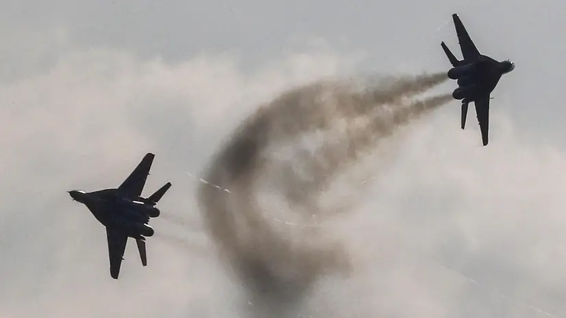 epa07810311 MiG 29 jet fighters of Russian aerobatic team Strizhi (Swifts) perform during the MAKS 2019 International Aviation and Space Salon in Zhukovsky outside Moscow, Russia, 01 September 2019. The Salon runs from 27 August to 01 September. EPA/SERGEI ILNITSKY