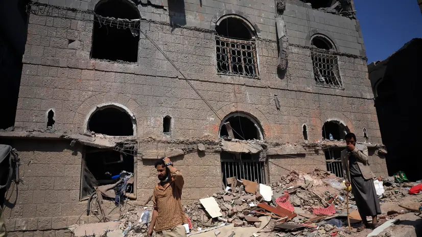 epa12372684 People inspect the site of the recent Israeli strikes in Sana'a, Yemen, 13 September 2025. At least 46 people were killed and 165 wounded on 10 September in Israeli strikes on two Houthi-controlled Yemeni cities of Sana'a and Al-Jawf in response to the escalation of Houthi missile-drone attacks on Israel, the Houthi-run Health Ministry reported. EPA/YAHYA ARHAB
