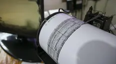 epa06343277 A seismograph is seen at the Mount Agung monitoring station in Karangasem, Bali, Indonesia, 22 November 2017. Volcanology and Geological Disaster Mitigation Centre confirmed the start of eruption of Mount Agung on 21 November 2017 evening, with an ash cloud rising 700 meters above the summit. EPA/MADE NAGI